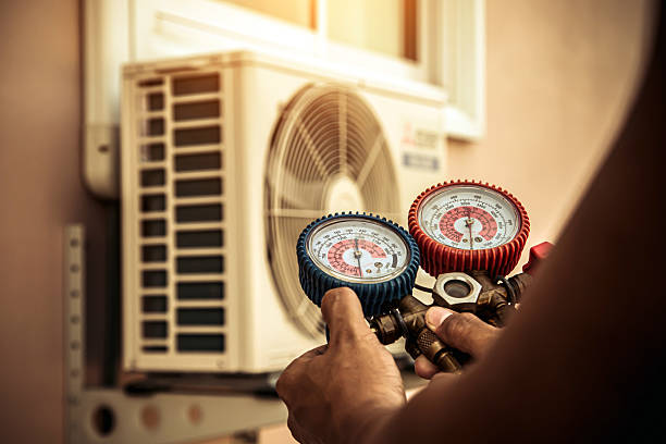 Professional Air Conditioning Service technician working in Steele, AL